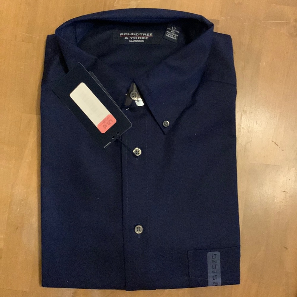 Men’s long sleeve button down navy shirt from Dillards.
